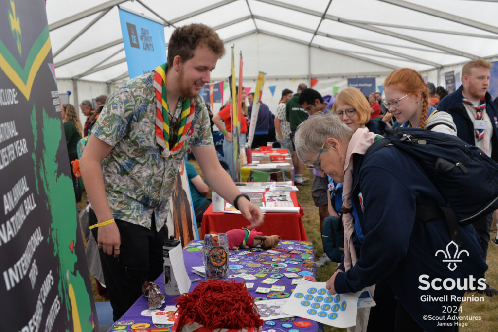 Group of leaders view a stall in the programme tent