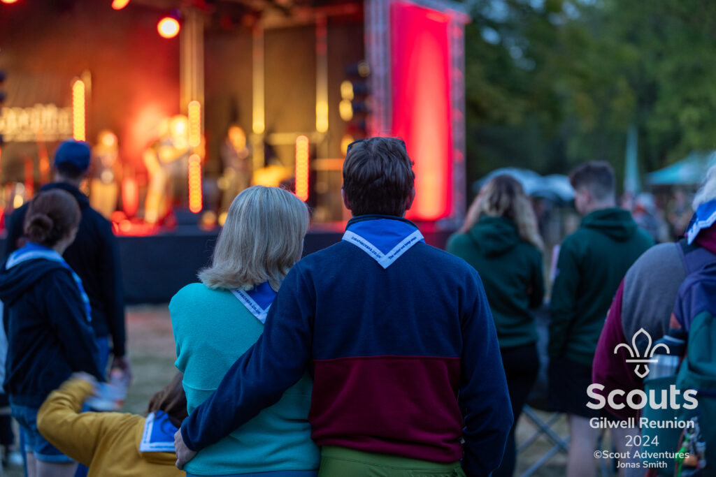 Two people looking at the stage