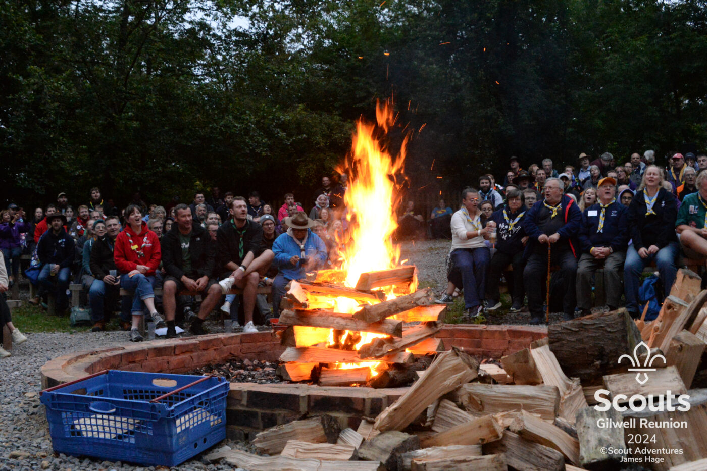 A Scout camp fire blazes